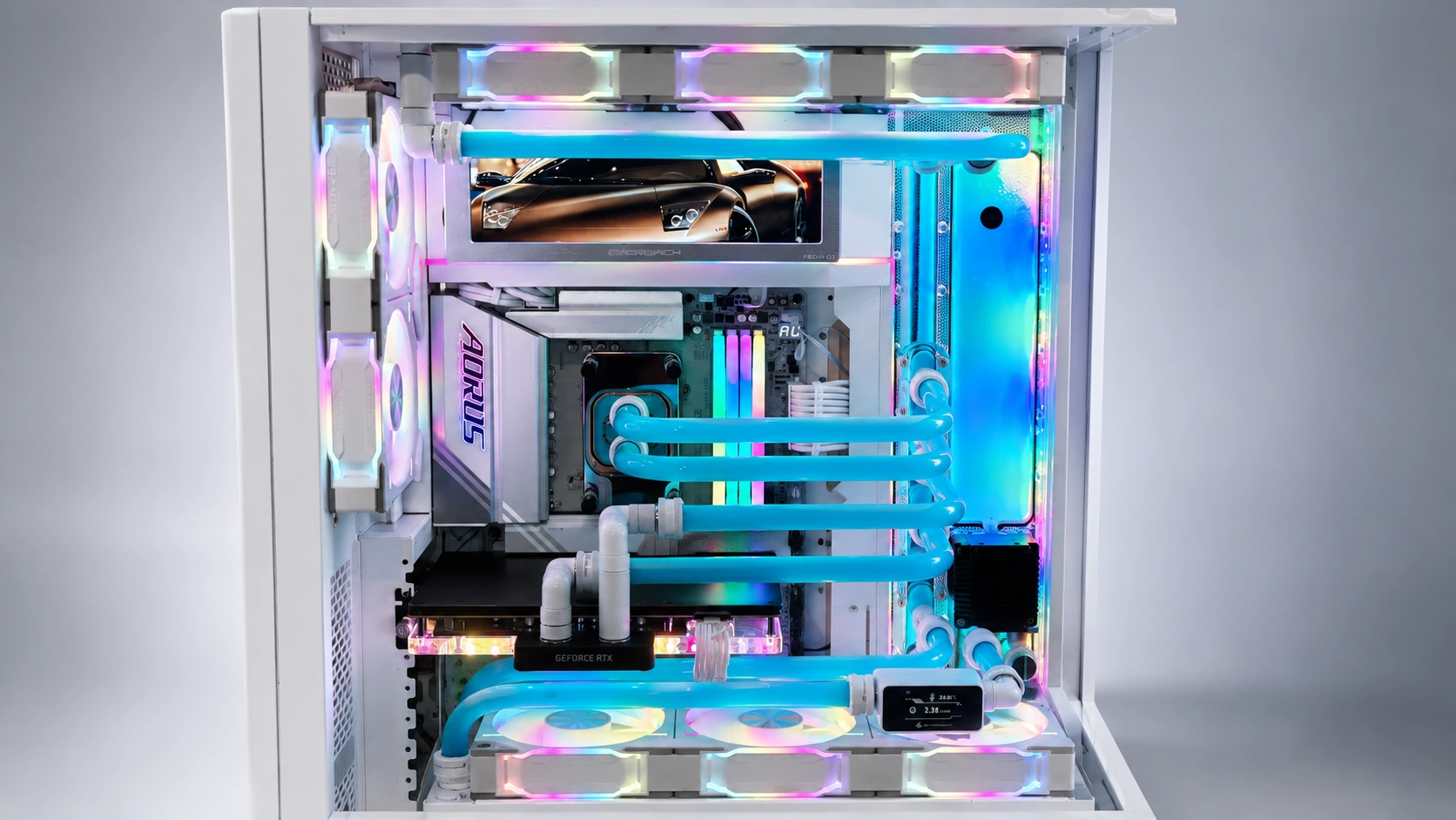Closer view of the blue custom water-cooling loop, fittings and radiators